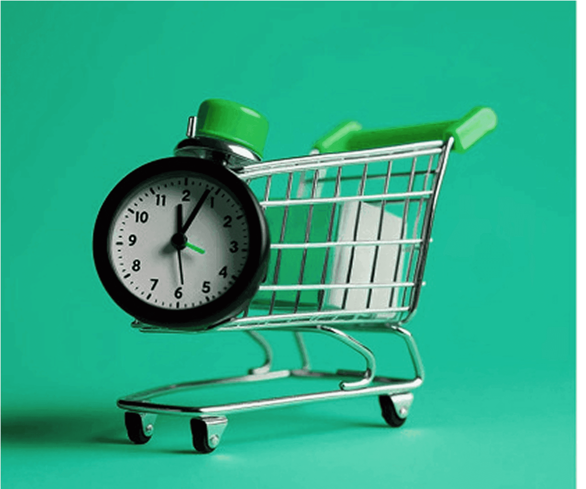 Mini shopping cart holding an alarm clock on a green background.